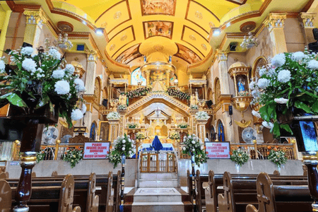 Altar of Simala Church adorned with flowers