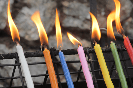 Lit colorful candles
