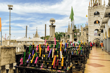 Stands of candles offered at Simala Shrine