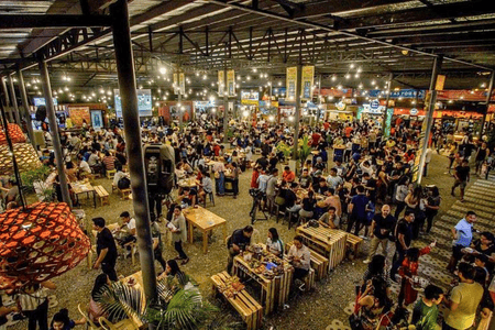 A view of The Market bustling with people enjoying their food