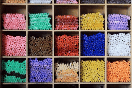 Colorful candles stored by color