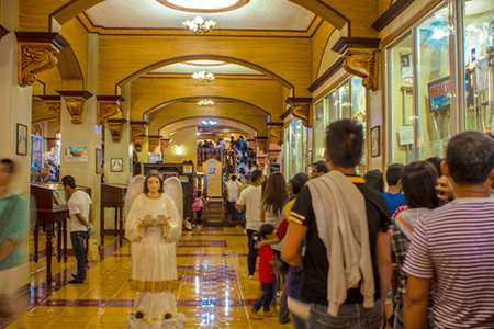 People falling in line inside the Simala Shrine