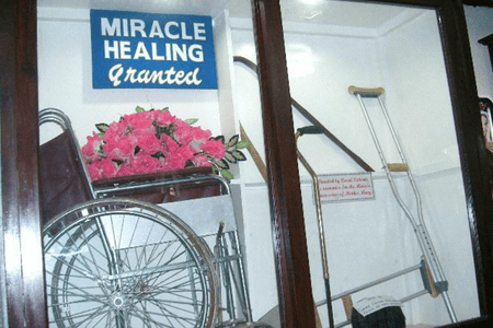 Crutches and wheelchairs donated by healed individuals on display