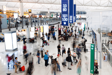 busy airport with numerous passengers 