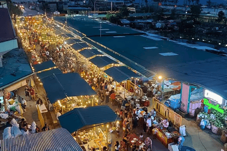 Top view of the Carbon night market filled with lights and people