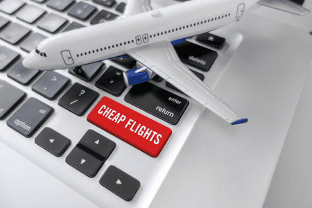 toy plane on a keyboard