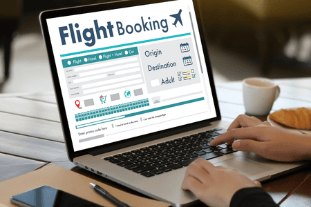 person booking a flight online