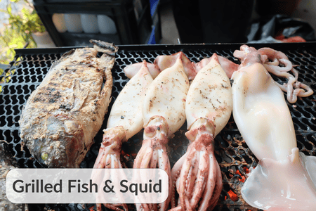 Freshly caught fish and squid, grilled over an open flame