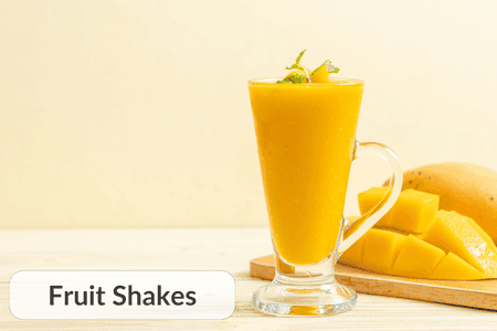 Fresh mango shake on a glass
